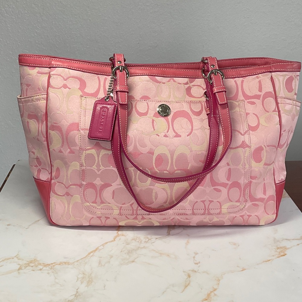 COACH: diaper bag.